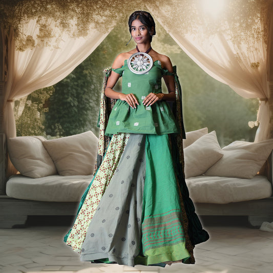 Elegant Green Off Shoulder Top with Ribbon Tied Sleeves Paired with Green Bottom Handloom Ikkat Bell Lehenga by Irani Mitra