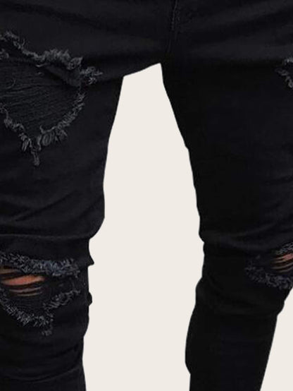 Tapered Button Fly Zip Hem Ripped Skinny Jeans