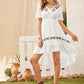 White V-Neck Short Flutter Sleeve Botanical Embroidered Dip Hem Dress