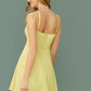 Pastel Yellow Sleeveless Twist Front Peekaboo Cami Dress