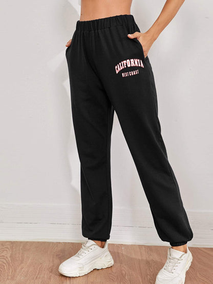 Sporty High Elastic Waist Letter Graphic Slant Pocket Joggers Sweatpants