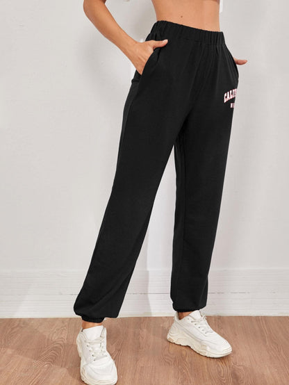 Sporty High Elastic Waist Letter Graphic Slant Pocket Joggers Sweatpants