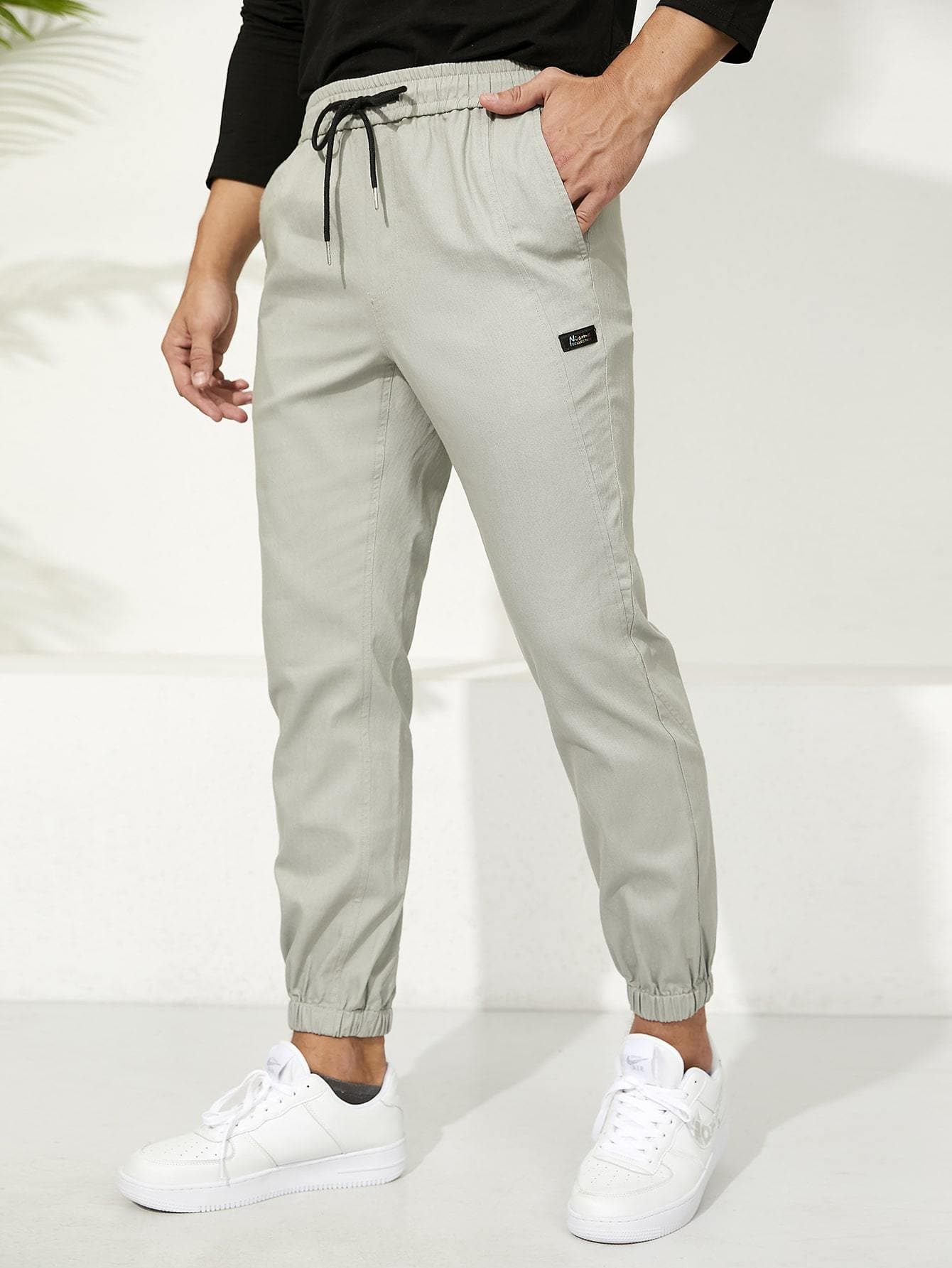 Letter Patched Drawstring Waist Tapered Pants