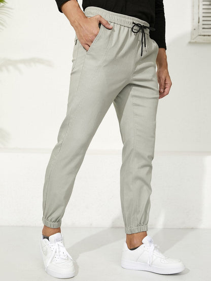 Letter Patched Drawstring Waist Tapered Pants